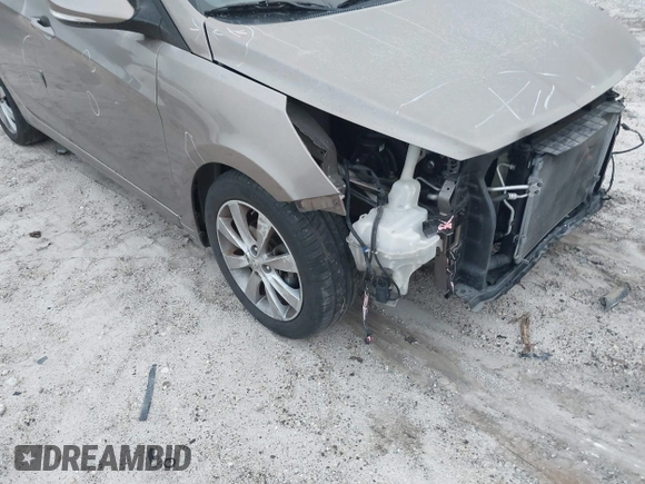 2014 Hyundai Accent SE with VIN KMHCU5AE0EU169214, listed as a IAAI auction lot 41925749 with 119,544 mi miles. Bid and sale history available at carsss.com. Image 13.