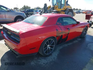 2016 Dodge Challenger R/T Scat Pack with VIN 2C3CDZFJXGH345584, listed as a IAAI auction lot 41305690 with 49,994 mi miles and . Bid and sale history available at DreamBid. Image 4.