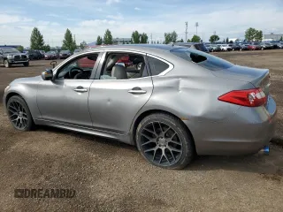 2011 Infiniti M with VIN JN1BY1ARXBM370844, listed as a Copart auction lot 62425515 with 277,315 mi miles and Salvage title. Bid and sale history available at DreamBid. Image 2.