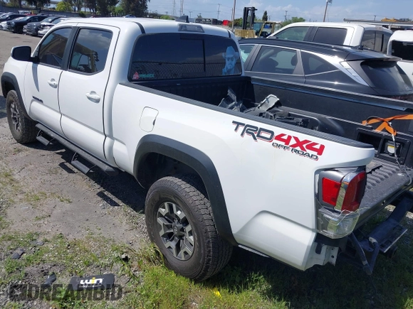 2021 Toyota Tacoma 4WD SR5 with VIN 3TMDZ5BN7MM103321, listed as a IAAI auction lot 41765512 with 49,009 mi miles. Bid and sale history available at carsss.com. Image 3.