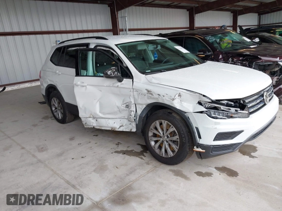 2020 Volkswagen Tiguan S z VIN 3VV1B7AX1LM110352, wystawiony jako IAAI lot #42224581 z przebiegiem 60 597 mil mil oraz . Historia ofert i sprzedaży dostępna na DreamBid. Obrazek 1.