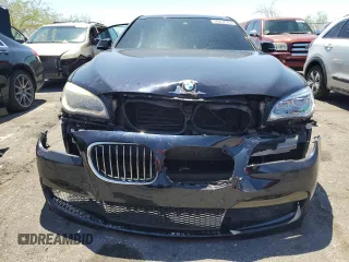 2014 BMW 7 Series ALPINA B7 with VIN WBAYE8C57ED136312, listed as a Copart auction lot 56057305 with 137,127 mi miles and Salvage title. Bid and sale history available at DreamBid. Image 5.