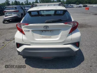 2018 Toyota C-HR XLE with VIN NMTKHMBX6JR027395, listed as a Copart auction lot 63071605 with 124,293 mi miles and Clean title. Bid and sale history available at DreamBid. Image 6.