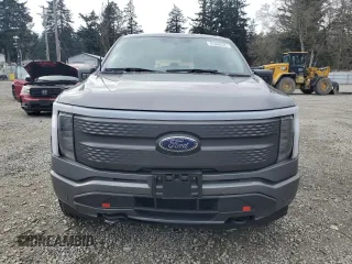 2023 Ford F-150 Lightning Pro with VIN 1FTVW1EL8PWG38419, listed as a Copart auction lot 47630535 with 11,940 mi miles and Salvage Title. Bid and sale history available at DreamBid. Image 5.