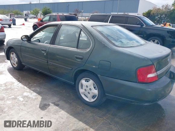 2000 Nissan Altima XE with VIN 1N4DL01D4YC102704, listed as a IAAI auction lot 41538425 with 228,639 mi miles and . Bid and sale history available at DreamBid. Image 3.