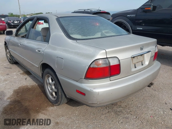 1996 Honda Accord Value with VIN 1HGCD5690TA212711, listed as a IAAI auction lot 42035289 with 184,592 mi miles and . Bid and sale history available at carsss.com. Image 3.