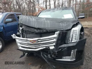 2018 Cadillac Escalade ESV Platinum z VIN 1GYS4KKJ4JR344128, wystawiony jako IAAI lot #41133274 z przebiegiem 159 941 mil mil oraz . Historia ofert i sprzedaży dostępna na DreamBid. Obrazek 12.