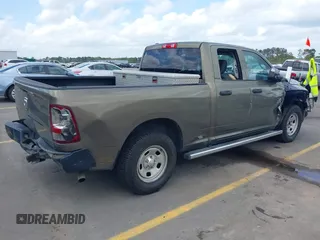 2014 Ram 1500 Tradesman with VIN 1C6RR6FG6ES233212, listed as a IAAI auction lot 41940763 with 131,914 mi miles and . Bid and sale history available at DreamBid. Image 4.