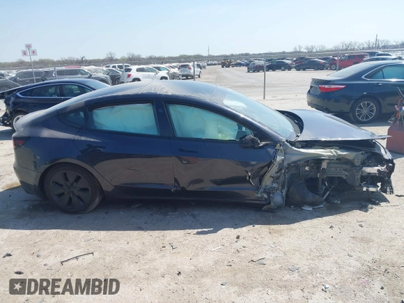 2024 Tesla Model 3 z VIN 5YJ3E1EA5RF843972, wystawiony jako IAAI lot #41873089 z przebiegiem 9 788 mil mil oraz . Historia ofert i sprzedaży dostępna na DreamBid. Obrazek 13.