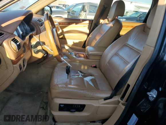 2005 Porsche Cayenne S with VIN WP1AB29P65LA63165, listed as a Copart auction lot 70038744 with 192,060 mi miles and Salvage Title. Bid and sale history available at carsss.com. Image 7.