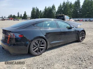 2021 Tesla Model S Plaid with VIN 5YJSA1E66MF434066, listed as a Copart auction lot 61648755 with Not provided miles and Salvage title. Bid and sale history available at DreamBid. Image 3.