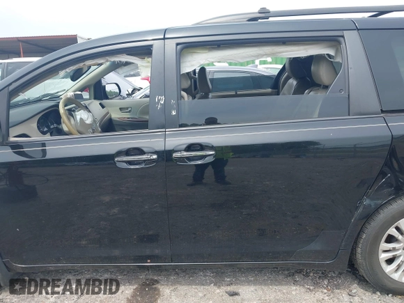 2011 Toyota Sienna XLE AAS with VIN 5TDYK3DC3BS103531, listed as a IAAI auction lot 42290142 with 231,995 mi miles and . Bid and sale history available at DreamBid. Image 14.