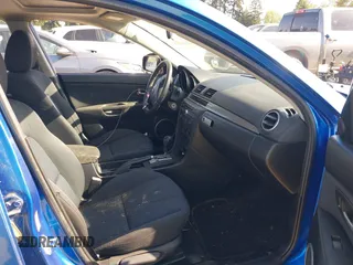 2006 Mazda 3 S Grand Touring with VIN JM1BK323561436552, listed as a IAAI auction lot 42218078 with 244,217 mi miles and . Bid and sale history available at DreamBid. Image 5.
