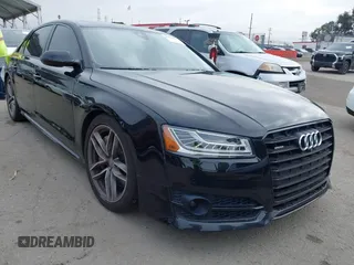 2017 Audi A8 Sport z VIN WAU43AFD0HN019412, wystawiony jako IAAI lot #42183917 z przebiegiem 84 991 mil mil oraz . Historia ofert i sprzedaży dostępna na DreamBid. Obrazek 1.