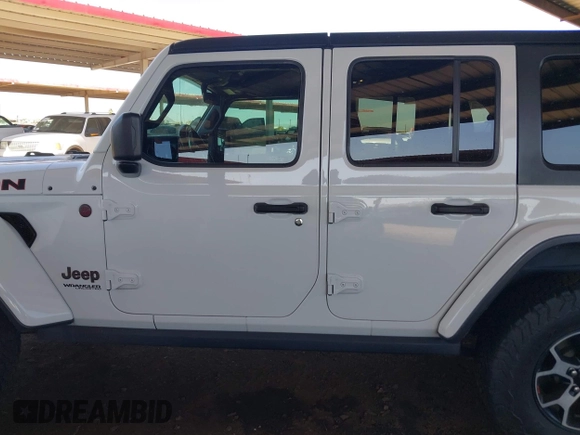 2020 Jeep Wrangler Unlimited Rubicon with VIN 1C4HJXFGXLW107958, listed as a IAAI auction lot 42058477 with 69,951 mi miles and . Bid and sale history available at DreamBid. Image 14.