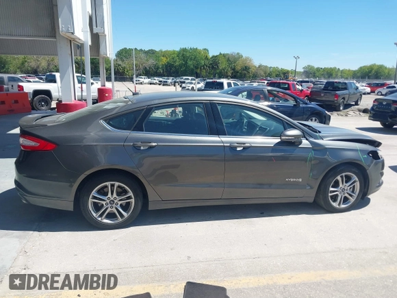 2016 Ford Fusion SE Hybrid with VIN 3FA6P0LU3GR127121, listed as a IAAI auction lot 41840795 with 88,281 mi miles. Bid and sale history available at carsss.com. Image 14.
