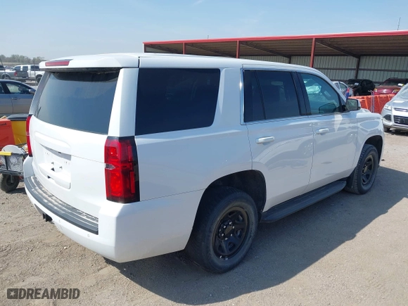 2020 Chevrolet Tahoe Commercial with VIN 1GNSKDEC8LR258254, listed as a IAAI auction lot 42104608 with 105,895 mi miles. Bid and sale history available at carsss.com. Image 4.