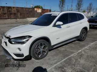 2018 BMW X1 xDrive28i with VIN WBXHT3C34J5K26230, listed as a Copart auction lot 50069465 with 89,520 mi miles and Salvage Title. Bid and sale history available at carsss.com. Image 1.