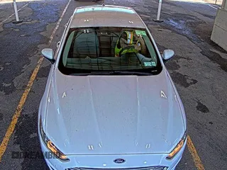 2015 Ford Fusion S with VIN 1FA6P0G7XF5127770, listed as a IAAI auction lot 42845978 with 150,942 mi miles and . Bid and sale history available at DreamBid. Image 16.