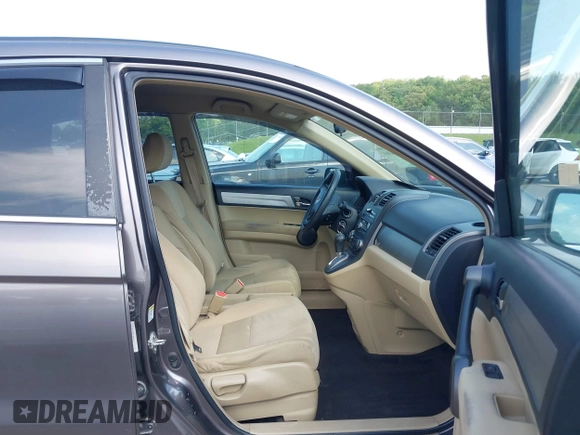 2011 Honda CR-V SE with VIN 5J6RE4H43BL089811, listed as a IAAI auction lot 42144060 with 212,559 mi miles and . Bid and sale history available at carsss.com. Image 5.