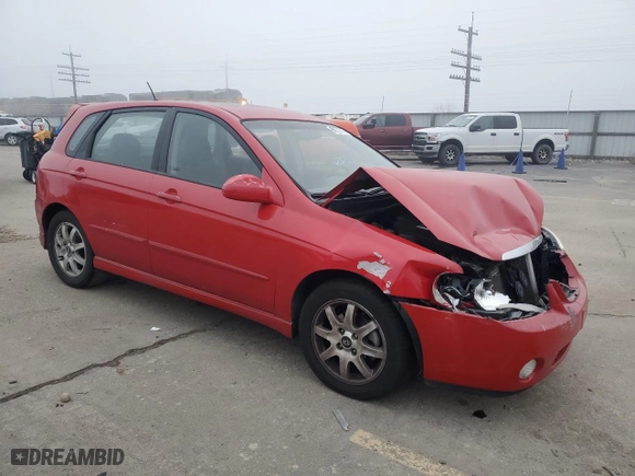 2005 Kia Spectra with VIN KNAFE161555106792, listed as a Copart auction lot 82832374 with 101,747 mi miles and Salvage Title. Bid and sale history available at carsss.com. Image 4.