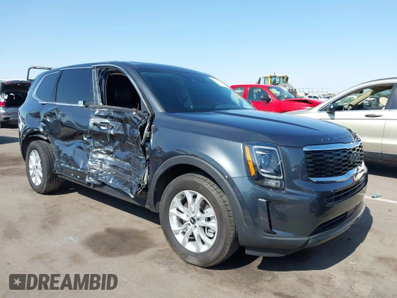 2022 Kia Telluride LX z VIN 5XYP2DHCXNG286083, wystawiony jako IAAI lot #42455962 z przebiegiem 24 599 mil mil oraz . Historia ofert i sprzedaży dostępna na DreamBid. Obrazek 1.