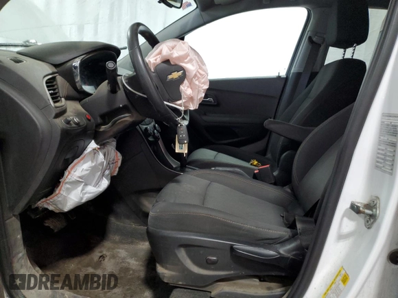 2018 Chevrolet Trax LT with VIN 3GNCJPSB5JL335123, listed as a Copart auction lot 52340495 with 107,257 mi miles and Salvage Title. Bid and sale history available at DreamBid. Image 7.