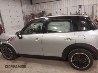 2015 MINI Countryman z VIN WMWZB3C59FWR46546, wystawiony jako IAAI lot #41687489 z przebiegiem 95 734 mil mil oraz . Historia ofert i sprzedaży dostępna na DreamBid. Obrazek 14.