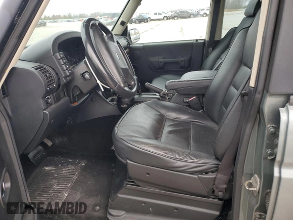 2004 Land Rover Discovery with VIN SALTP194X4A830546, listed as a Copart auction lot 82341194 with 142,568 mi miles and Clean Title. Bid and sale history available at DreamBid. Image 7.