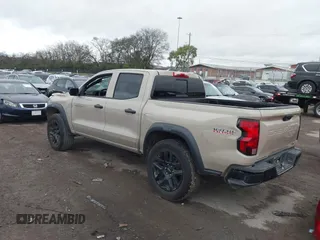2023 Chevrolet Colorado 4WD Trail Boss with VIN 1GCPTEEK8P1239877, listed as a IAAI auction lot 40893691 with 30,617 mi miles. Bid and sale history available at carsss.com. Image 3.