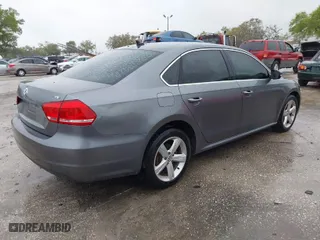 2015 Volkswagen Passat 1.8T Limited Edition with VIN 1VWAT7A34FC089282, listed as a IAAI auction lot 41767239 with 68,156 mi miles. Bid and sale history available at carsss.com. Image 4.