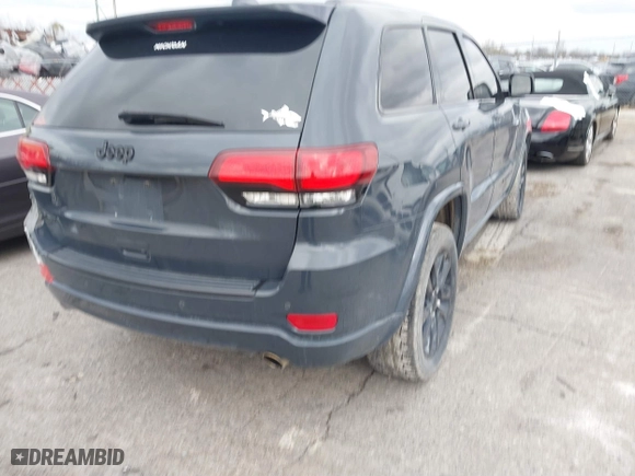 2018 Jeep Grand Cherokee Laredo E with VIN 1C4RJFAG0JC267822, listed as a IAAI auction lot 40876905 with 136,491 mi miles. Bid and sale history available at carsss.com. Image 4.