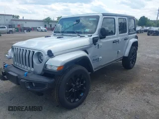 2023 Jeep Wrangler Sahara with VIN 1C4JJXP69PW695915, listed as a IAAI auction lot 42662028 with 36,957 mi miles and . Bid and sale history available at DreamBid. Image 19.