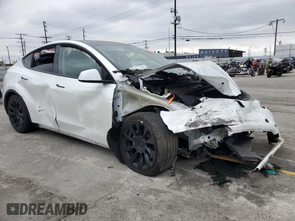 2023 Tesla Model Y Long Range z VIN 7SAYGDEE9PA070232, wystawiony jako Copart lot #55881805 z przebiegiem 38 276 mil mil oraz Szkoda całkowita • Salvage title. Historia ofert i sprzedaży dostępna na DreamBid. Obrazek 4.