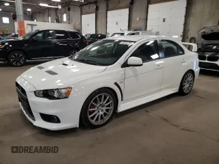 2010 Mitsubishi Lancer Evolution GSR z VIN JA32W8FV8AU007926, wystawiony jako Copart lot #59334735 z przebiegiem 52 816 mil mil oraz Szkoda całkowita • Salvage title. Historia ofert i sprzedaży dostępna na DreamBid. Obrazek 1.