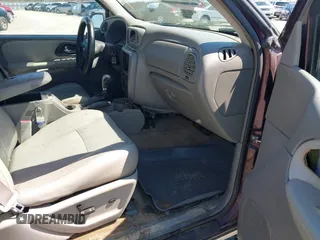 2006 Chevrolet TrailBlazer LT with VIN 1GNES13M262161488, listed as a IAAI auction lot 41774799 with 214,132 mi miles. Bid and sale history available at carsss.com. Image 5.