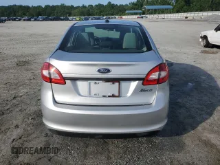2013 Ford Fiesta S z VIN 3FADP4AJ9DM140665, wystawiony jako Copart lot #61634485 z przebiegiem 165 124 mil mil oraz Szkoda całkowita • Salvage title. Historia ofert i sprzedaży dostępna na DreamBid. Obrazek 6.
