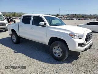 2023 Toyota Tacoma SR z VIN 3TMCZ5AN5PM594103, wystawiony jako Copart lot #52957955 z przebiegiem 21 759 mil mil oraz Szkoda całkowita • Salvage title. Historia ofert i sprzedaży dostępna na DreamBid. Obrazek 4.