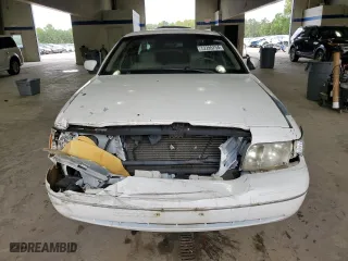 2003 Ford Crown Victoria LX with VIN 2FAFP74W23X134274, listed as a Copart auction lot 73295754 with 212,581 mi miles and Salvage Title. Bid and sale history available at carsss.com. Image 5.