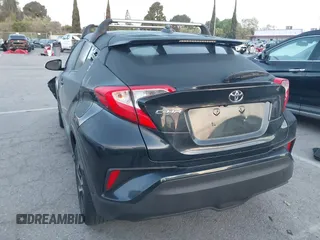 2019 Toyota C-HR XLE with VIN JTNKHMBXXK1034717, listed as a IAAI auction lot 41939078 with 56,309 mi miles. Bid and sale history available at carsss.com. Image 3.