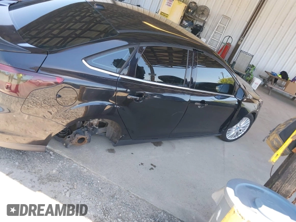 2013 Ford Focus Titanium with VIN 1FADP3J20DL143491, listed as a IAAI auction lot 42034388 with 194,388 mi miles and . Bid and sale history available at carsss.com. Image 11.