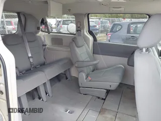 2010 Dodge Grand Caravan SXT with VIN 2D4RN5D18AR218903, listed as a IAAI auction lot 41560484 with Not Provided miles and . Bid and sale history available at DreamBid. Image 8.