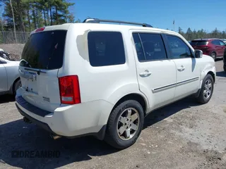 2011 Honda Pilot Touring with VIN 5FNYF4H98BB087713, listed as a IAAI auction lot 42132764 with 250,507 mi miles. Bid and sale history available at carsss.com. Image 4.