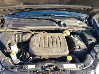 2018 Dodge Grand Caravan SXT with VIN 2C4RDGCG2JR266074, listed as a IAAI auction lot 40545630 with 98,036 mi miles and . Bid and sale history available at DreamBid. Image 10.