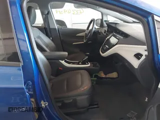 2018 Chevrolet Bolt EV Premier z VIN 1G1FX6S02J4130855, wystawiony jako IAAI lot #42249019 z przebiegiem 38 293 mil mil oraz . Historia ofert i sprzedaży dostępna na DreamBid. Obrazek 5.
