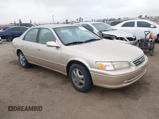 2001 Toyota Camry CE z VIN JT2BG22K510550741, wystawiony jako IAAI lot #42444284 z przebiegiem 220 764 mil mil oraz . Historia ofert i sprzedaży dostępna na DreamBid. Obrazek 1.