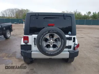 2016 Jeep Wrangler Unlimited Sahara с VIN 1C4HJWEG8GL345391, выставлен на аукционе IAAI как лот 42158328 с пробегом 61 020 миль миль и . История ставок и продаж доступна на DreamBid. Изображение 16.