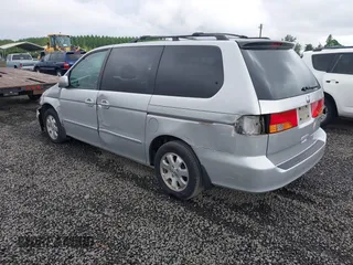 2003 Honda Odyssey EX-L z VIN 5FNRL18033B042810, wystawiony jako IAAI lot #42229495 z przebiegiem 231 682 mil mil oraz . Historia ofert i sprzedaży dostępna na DreamBid. Obrazek 3.