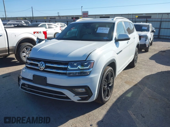 2018 Volkswagen Atlas SEL with VIN 1V2RR2CA1JC566065, listed as a IAAI auction lot 41687434 with 77,795 mi miles and . Bid and sale history available at DreamBid. Image 2.