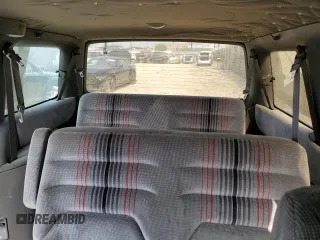 1991 Dodge Caravan z VIN 2B4GK55R6MR136865, wystawiony jako Copart lot #83209824 z przebiegiem 44 931 mil mil oraz Tytuł czysty. Historia ofert i sprzedaży dostępna na DreamBid. Obrazek 10.